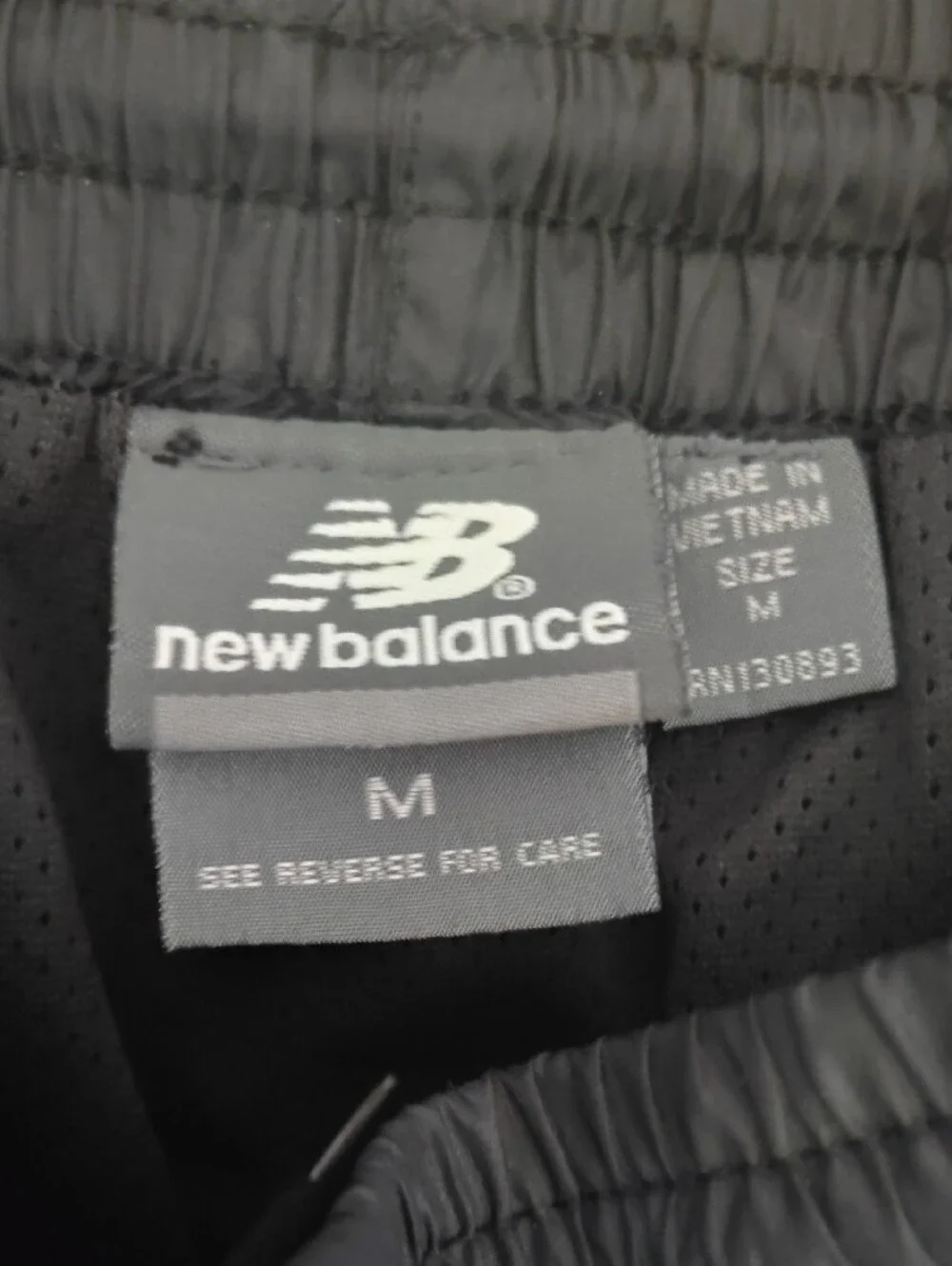 New Balance Black Lightweight Nylon Windbreaker Pants